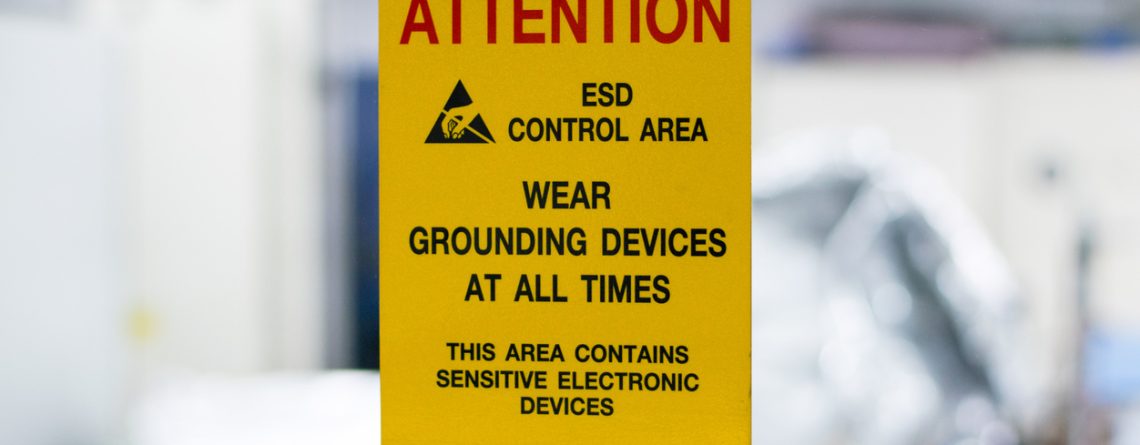 yellow attention sign to wear grounding devices